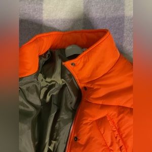 Orange puffer jacket